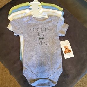 NWT Set of five graphic onesies